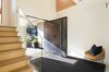 Steel pivot entry door Photo 6 of Hawthorne Residence modern home