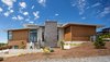 The forms step up the hill with the slope Photo 2 of Evergreen Pointe House modern home