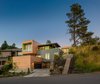 Modern home with Exterior, House Building Type, Wood Siding Material, and Metal Siding Material. Entry courtyard and the 'Lone Pine' Photo 2 of Panavista Hill House