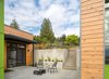 Modern home with Outdoor, Back Yard, Hardscapes, Raised Planters, Grass, Shrubs, Concrete Patio, Porch, Deck, and Pavers Patio, Porch, Deck. Private courtyard Photo 11 of Panavista Hill House