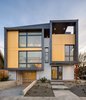Modern home with Exterior, Metal Roof Material, House Building Type, Flat RoofLine, Shed RoofLine, and Metal Siding Material. Exterior elevation showing split levels Photo 2 of Lightbox 23