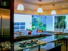 Frame-less corner window at kitchen Photo 7 of Florida Home modern home