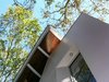 Exterior detail stair tower with metal ribs and hardwood cladding Photo 4 of Florida Home modern home
