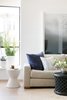 Living room featuring Eskayel textiles and St. Frank coffee table. Photo 2 of Laurel Heights Residence modern home
