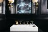 Kohler marble sink and gold faucet add modern drama. Photo 6 of 2017 San Francisco Decorator Showcase modern home