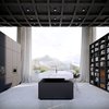 Modern home with Kitchen, Marble Counter, Concrete Floor, Undermount Sink, Recessed Lighting, and Refrigerator. Kitchen and Dinning Room Photo 4 of Infinity House