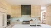 Modern home with Kitchen, Refrigerator, Wall Oven, Range Hood, Concrete Floor, Drop In Sink, Range, Wood Cabinet, and Recessed Lighting. CCY Architects | Red Butte Kitchen - The homes wood material palate includes white oak, beetle kill spruce and reclaimed elm. Photo 5 of Red Butte