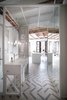 Modern home with Bath Room, Pendant Lighting, Drop In Sink, and Ceramic Tile Floor. View from the bedroom towards the living zone. Photo 4 of LIGHTSLICE apartment
