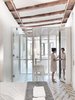 Strategically placed mirrors have placed in order to stretch the space. Photo 9 of LIGHTSLICE apartment modern home
