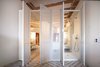 Modern home with Bath Room, Ceiling Lighting, Pendant Lighting, One Piece Toilet, Open Shower, Freestanding Tub, and Undermount Sink. The LightBox also contains the wet area. Photo 3 of LIGHTSLICE apartment