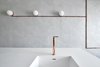 Modern home with Kitchen, White Cabinet, Concrete Backsplashe, Engineered Quartz Counter, Concrete Floor, and Wall Lighting. Custom made copper Fossets and custom made wall fixtures Photo 10 of The Marina Apartment