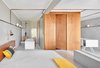 Modern home with Concrete Floor and Wall Lighting. Bedroom & Bathroom Area Photo 17 of The Marina Apartment