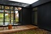 Modern home with Exterior, Concrete Siding Material, Wood Siding Material, Glass Siding Material, House Building Type, and Flat RoofLine. Small back terrasse on sunset Photo 6 of Prévert