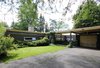 Modern home with Exterior, Wood Siding Material, House Building Type, Flat RoofLine, and Mid-Century Building Type. Original house Photo 11 of Prévert