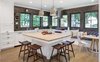 Woodblock island and a cozy banquette complete the kitchen look Photo 2 of Grant Park Dutchie modern home