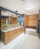 Modern home with Table, Study Room Type, Library Room Type, Desk, and Kitchen. Floating cabinets lighten the feel of the room Photo 5 of Tanner Place