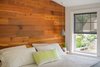 Modern home with Carpet Floor, Bedroom, Pendant Lighting, and Bed. Cozy and minimalist, the wall becomes the headboard and focal point Photo 4 of Hurst Avenue