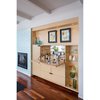 Modern home with Chair, Carpet Floor, End Tables, Lamps, Storage, Medium Hardwood Floor, Recessed Lighting, Media Cabinet, Sectional, and Living Room. Custom built-in bar with mirrored backdrop Photo 4 of Block 90 Penthouse