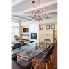 Modern home with Storage, Bar, Medium Hardwood Floor, Carpet Floor, Recessed Lighting, Standard Layout Fireplace, Dining Room, and Pendant Lighting. The custom dining table makes the space feel transparent yet formal Photo 5 of Block 90 Penthouse