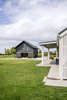 Modern home with Exterior, Wood Siding Material, Gable RoofLine, House Building Type, Farmhouse Building Type, and Metal Roof Material. Upcountry Maui Cottage and Barn Photo 12 of Haiku Maui