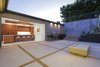 Outdoor Living - The Firepit is wired for a projector to show outdoor movies on the wall Photo 6 of The Pinstripe House - Mid-Century Modern Minimalism. Available for $7,750,000 modern home