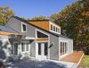 Modern home with Exterior, House Building Type, Metal Roof Material, and Wood Siding Material. Entry View Photo 2 of Sliwinski Residence