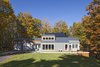 Modern home with Exterior, House Building Type, Metal Roof Material, and Wood Siding Material. Street Elevation Photo of Sliwinski Residence