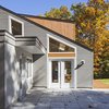 Modern home with Exterior, House Building Type, Metal Roof Material, and Wood Siding Material. Entry Court Photo 3 of Sliwinski Residence