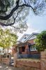The bungalow frontage reinstates traditional detailing - contributing to the established streetscape. Photo of Enmore House modern home