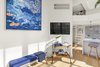 Modern home with Living Room. The living area with a view of the open kitchen and loft space. Photo 4 of A Greenwich Village Loft Gets a Makeover