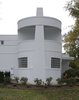 Chimney with porch on upper level off original master. Photo 9 of The Boat House modern home