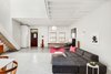 Modern home with Living Room, End Tables, Concrete Floor, Sectional, Pendant Lighting, and Chair. Living Room Photo 4 of Brooklyn Carriage House