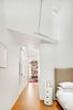 Modern home with Bedroom, Table Lighting, Night Stands, and Bed. Bedroom to Library Photo 7 of Brooklyn Carriage House