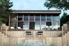 Existing House with Deck Addition Photo 20 of Bay Walk Residence modern home