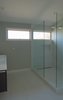 Modern home with Bath Room, Porcelain Tile Wall, Wall Mount Sink, Porcelain Tile Floor, Recessed Lighting, Vessel Sink, Corner Shower, Ceiling Lighting, and One Piece Toilet. Master bathroom Photo 18 of Bay View House