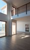 Modern home with Living Room, Ceiling Lighting, Light Hardwood Floor, Hanging Fireplace, and Recessed Lighting. Living room with master bedroom bridge Photo 6 of Bay View House