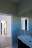 Modern home with Hallway and Light Hardwood Floor. Master bathroom with living room bridge Photo 19 of Bay View House