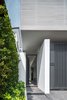 Modern home with Exterior, House Building Type, Metal Roof Material, and Metal Siding Material. the environment of the house is designed to be protective as well as open towards the changes at the same time Photo 4 of Y house