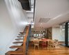 Modern home with Dining Room, Chair, Dark Hardwood Floor, Table, and Ceiling Lighting. Dining area Photo 8 of Y house