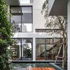 Modern home with Outdoor, Front Yard, Side Yard, Trees, Hardscapes, Small Pools, Tubs, Shower, Small Patio, Porch, Deck, Vertical Fences, Wall, and Landscape Lighting. the inner court features a small pond with a wooden deck Photo 10 of Y house