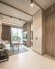 Modern home with Living Room, Wall Lighting, Ceiling Lighting, Sofa, Chair, and Ceramic Tile Floor. Warm and relax ambience Photo 3 of T House