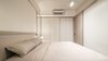 Modern home with Bedroom, Bed, Wardrobe, Storage, Shelves, Table Lighting, Wall Lighting, Pendant Lighting, and Ceiling Lighting. Wardrobe and storage with sliding panels Photo 5 of T House