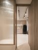 Modern home with Kitchen, Refrigerator, Granite Counter, Wood Cabinet, Ceramic Tile Floor, and Ceiling Lighting. Glazing partition helps bring more light to existing bathroom Photo 6 of T House