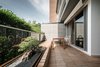 Modern home with Outdoor, Garden, Gardens, Trees, Hardscapes, Small Patio, Porch, Deck, Wood Patio, Porch, Deck, Metal Patio, Porch, Deck, and Decking Patio, Porch, Deck. Long bench on terrace with sunken bonsai planter Photo 8 of T House