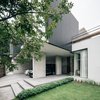 Modern home with Outdoor, Walkways, Garden, Small Pools, Tubs, Shower, Grass, Small Patio, Porch, Deck, Shrubs, Landscape Lighting, Front Yard, Large Patio, Porch, Deck, Trees, Concrete Patio, Porch, Deck, Wood Patio, Porch, Deck, Concrete Pools, Tubs, Shower, Gardens, and Metal Patio, Porch, Deck. foyer Photo 3 of bAAn