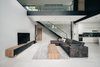 Modern home with Living Room, Floor Lighting, Bench, Wall Lighting, Table Lighting, Bookcase, Ceiling Lighting, Chair, Sofa, and Ceramic Tile Floor. living area Photo 4 of bAAn