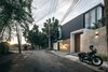Modern home with Exterior, Wood Siding Material, House Building Type, and Concrete Siding Material. main road Photo 13 of bAAn