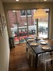 wall of windows in eat in kitchen lead to outdoor patio Photo 17 of Gorgeous Modern Architectural Dream Home in Highland Park, Birmingham, Alabama: For sale $512,500 modern home