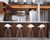 Modern home with Kitchen, Concrete Floor, Wood Cabinet, and Ceramic Tile Backsplashe. Existing kitchen with new furniture and accessories Photo of South Lake Union Loft
