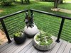 Veranda Armorguard decking and cable railing. Photo of Gayfields modern home